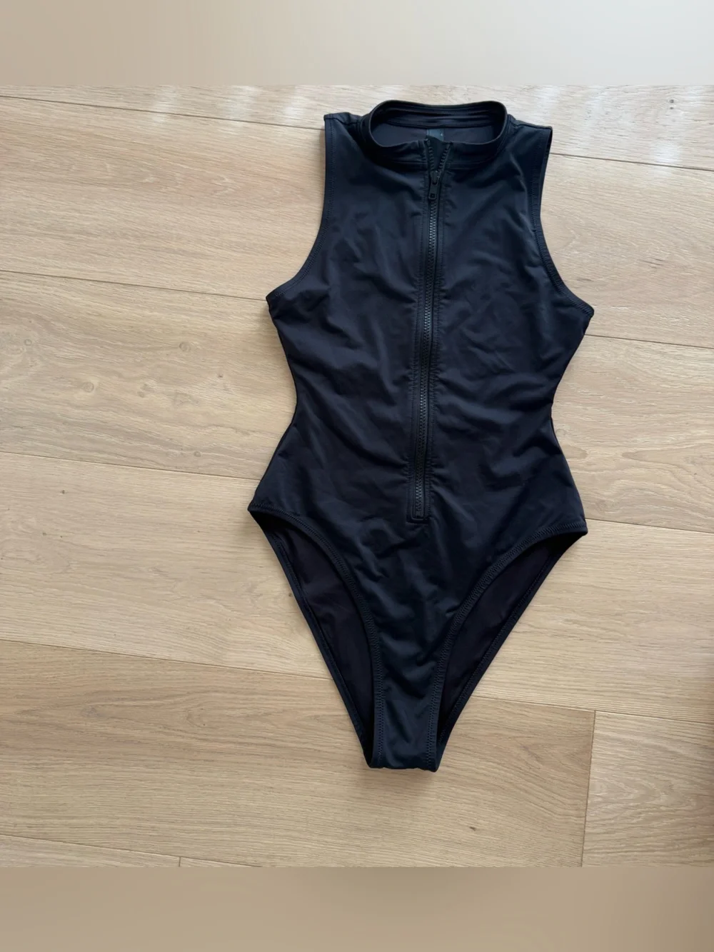 The Skims Black Zip-Front Swimsuit in Size Small